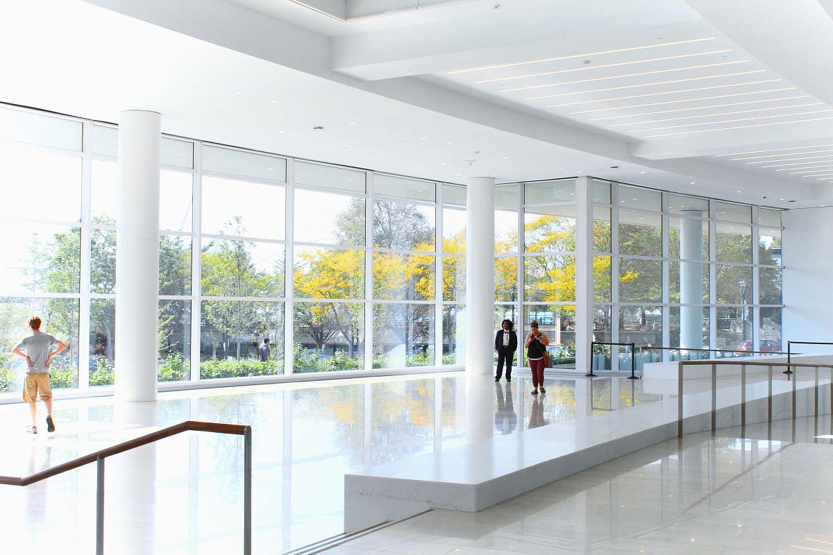 milwaukee people standing on white concrete window